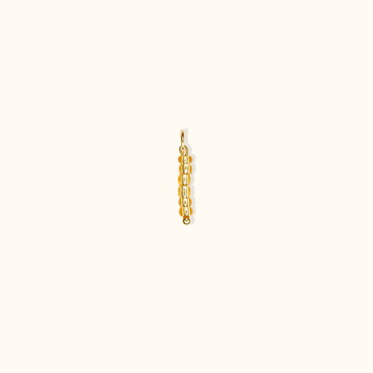 Golden Glimmer Charm